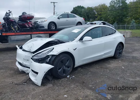2018 Tesla Model 3 Long Range/Performance z USA, uszkodzony, nr VIN 5YJ3E1EB7JF115583